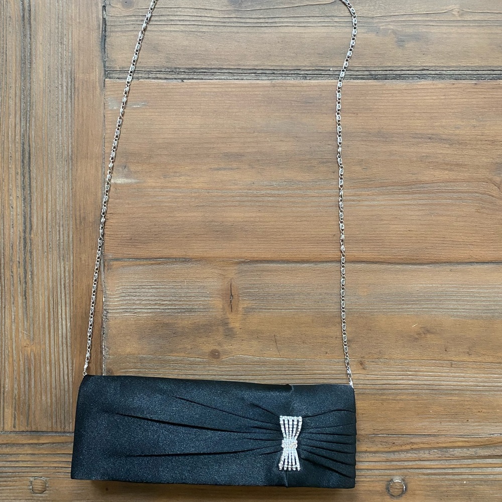 Charming Charlie Black Shiny Purse with Silver Bow